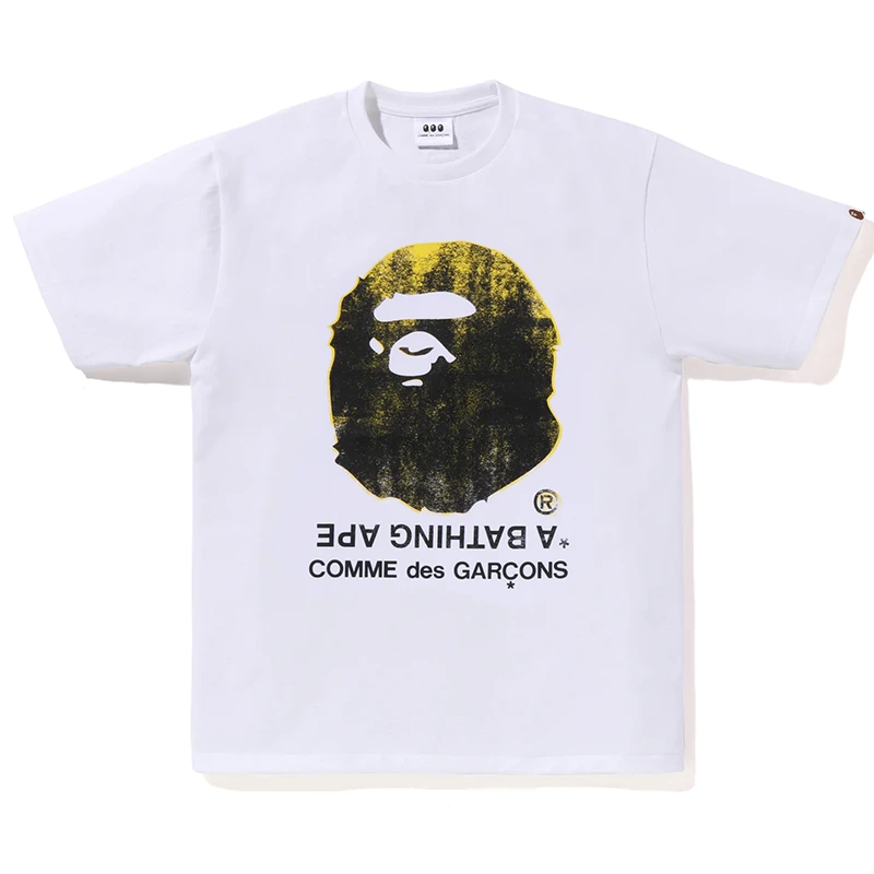 BAPE x COMME des GARÇONS BIG APE HEAD WHITE TEE 1 BAPE x COMME des GARÇONS BIG APE HEAD WHITE TEE <div class="product-short-description"><p>The BAPE x COMME des GARÇONS BIG APE HEAD WHITE TEE delivers a modern tee look inspired by BAPE streetwear graphics and collectible collaboration appeal. Ideal for adding recognizable sportswear and streetwear character to your rotation.</p></div>