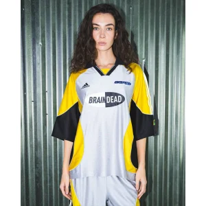 Areena Design <p><strong>Brain Dead x Adidas Short Sleeve Jersey</strong> delivers a sport-inspired jersey look for game-day outfits, fan styling, casual wear, and sports-themed events. Its distinctive design offers team-inspired appeal, easy casual pairing, and energetic visual identity, making it a strong choice for personal wardrobes, collections, or gifting.</p> Brain Dead x Adidas Short Sleeve Jersey <p><strong>Brain Dead x Adidas Short Sleeve Jersey</strong> delivers a sport-inspired jersey look for game-day outfits, fan styling, casual wear, and sports-themed events. Its distinctive design offers team-inspired appeal, easy casual pairing, and energetic visual identity, making it a strong choice for personal wardrobes, collections, or gifting.</p>