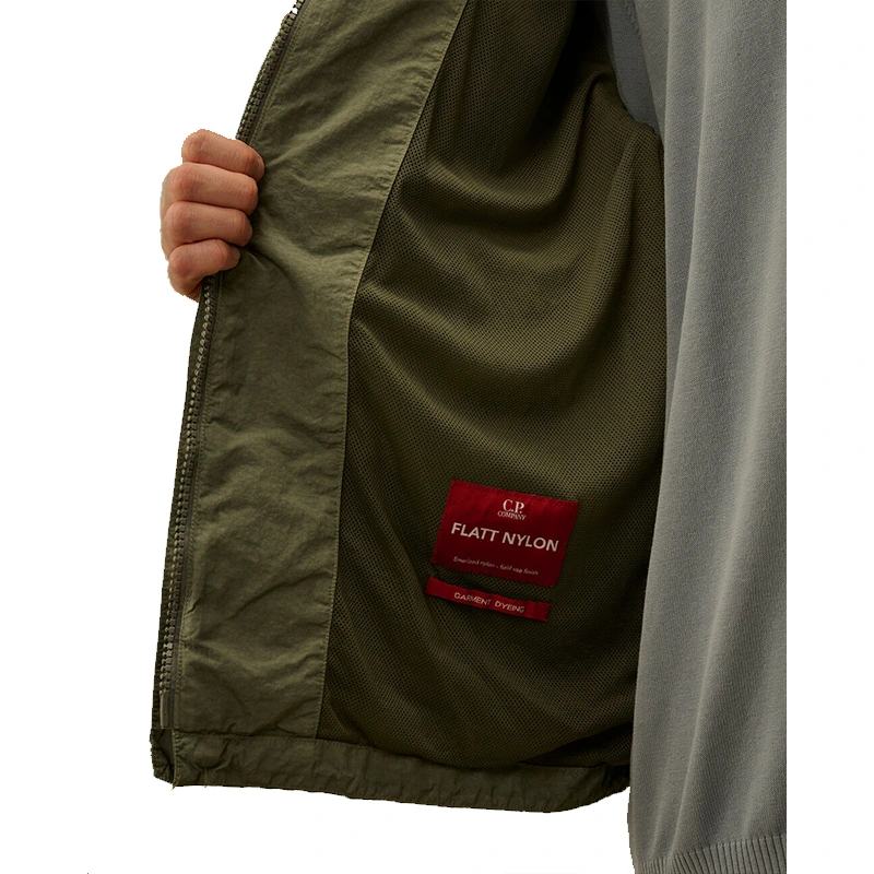 C.P. Company Flatt Nylon Laurel Wreath Goggle Jacket 1 C.P. Company Flatt Nylon Laurel Wreath Goggle Jacket <div class="product-short-description"><p>Refresh your wardrobe with the C.P. Company Flatt Nylon Laurel Wreath Goggle Jacket, a premium jacket combining C.P. Company utility design and signature goggle detailing. It stands out with signature goggle-inspired utility styling. A strong choice for fans, collectors, and everyday streetwear.</p></div>