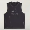 Areena Design <p><strong>Men's Adidas x Song For The Mute adi365 Running Tank Top</strong> delivers a sporty sleeveless tank top look for warm-weather outfits, gym-inspired looks, layering, and casual wear. Its distinctive design offers easy movement, flexible layering, and relaxed athletic appeal, making it a strong choice for personal wardrobes, collections, or gifting.</p> Men's Adidas x Song For The Mute adi365 Black Running Tank Top <p><strong>Men's Adidas x Song For The Mute adi365 Running Tank Top</strong> delivers a sporty sleeveless tank top look for warm-weather outfits, gym-inspired looks, layering, and casual wear. Its distinctive design offers easy movement, flexible layering, and relaxed athletic appeal, making it a strong choice for personal wardrobes, collections, or gifting.</p>