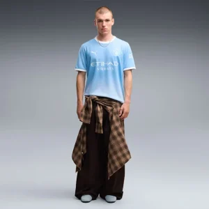 Areena Design <div class="product-short-description"><p>Refresh your wardrobe with the PUMA Manchester City Home Jersey, a premium jersey combining football-inspired design and fan-focused style. A strong choice for fans, collectors, and everyday streetwear.</p></div> PUMA Manchester City Home Jersey <div class="product-short-description"><p>Refresh your wardrobe with the PUMA Manchester City Home Jersey, a premium jersey combining football-inspired design and fan-focused style. A strong choice for fans, collectors, and everyday streetwear.</p></div>