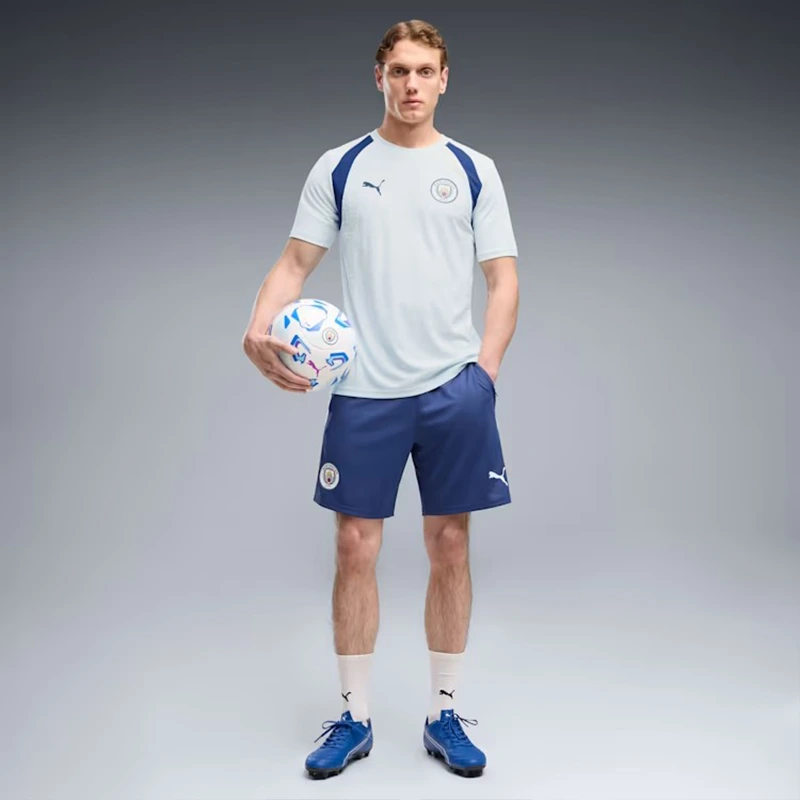 PUMA Manchester City Slim Soccer Training Jersey 3 PUMA Manchester City Slim Soccer Training Jersey <div class="product-short-description"><p>The PUMA Manchester City Slim Soccer Training Jersey delivers a modern training jersey look inspired by football-inspired design and fan-focused style. It stands out with a streamlined slim profile. Ideal for adding recognizable sportswear and streetwear character to your rotation.</p></div>