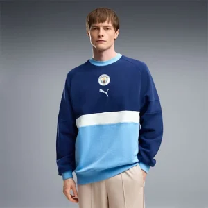 Areena Design <div class="product-short-description"><p>The PUMA Manchester City ftblCulture Relaxed Crew Sweatshirt delivers a modern crew sweatshirt look inspired by football-inspired design and fan-focused style. It stands out with a relaxed fit. Ideal for adding recognizable sportswear and streetwear character to your rotation.</p></div> PUMA Manchester City ftblCulture Relaxed Crew Sweatshirt <div class="product-short-description"><p>The PUMA Manchester City ftblCulture Relaxed Crew Sweatshirt delivers a modern crew sweatshirt look inspired by football-inspired design and fan-focused style. It stands out with a relaxed fit. Ideal for adding recognizable sportswear and streetwear character to your rotation.</p></div>