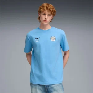 Areena Design <div class="product-short-description"><p>Shop the PUMA x KIDSUPER Manchester City Tee, a standout tee shaped by football-inspired design and fan-focused style. Easy to style, it brings a distinctive collaborative edge to casual outfits.</p></div> PUMA x KIDSUPER Manchester City Tee <div class="product-short-description"><p>Shop the PUMA x KIDSUPER Manchester City Tee, a standout tee shaped by football-inspired design and fan-focused style. Easy to style, it brings a distinctive collaborative edge to casual outfits.</p></div>
