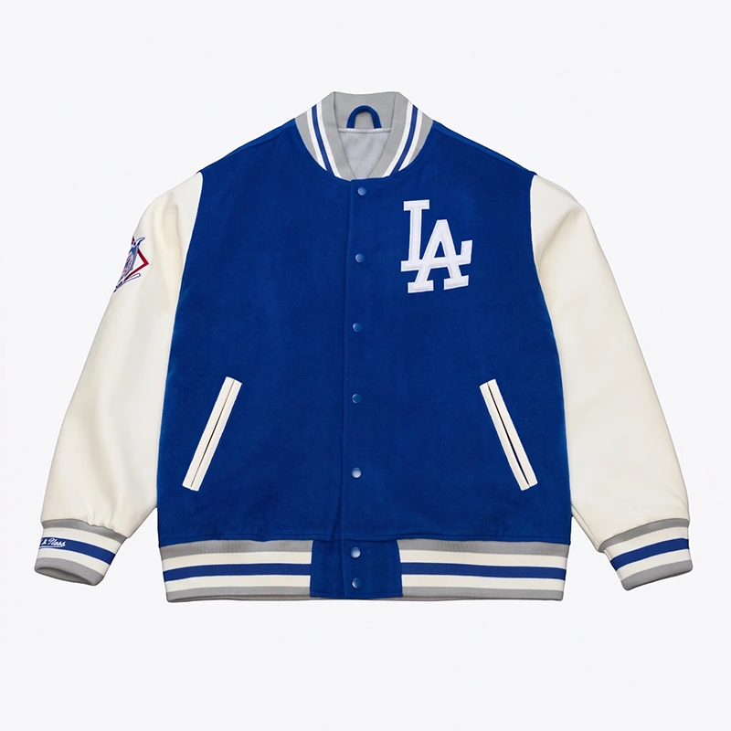 Los Angeles Dodgers Royal-White Off Day Varsity Full-Snap Jacket 1 Los Angeles Dodgers Royal/White Off Day Varsity Full-Snap Jacket <div class="product-short-description"><h2>Los Angeles Dodgers Royal/White Off Day Varsity Full-Snap Jacket</h2><p>The Los Angeles Dodgers Royal/White Off Day Varsity Full-Snap Jacket delivers a bold varsity full-snap jacket look shaped by team-inspired detailing and classic fanwear style. It features a clean white finish. Easy to style with jeans, tees, or casual separates, it brings memorable visual appeal to any modern wardrobe.</p></div>