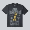 Areena Design <p>Shop the <strong>Armani Exchange T-Shirt</strong>, a stylish T-shirt for easy everyday wear. Pair it with jeans, shorts, or layers for casual outings, streetwear looks, travel, and gifting.</p> Men's New York Knicks Nike Gray 2026 NBA Finals Champions Authentic Locker Room Limited Edition On Court T-Shirt <p>Shop the <strong>Armani Exchange T-Shirt</strong>, a stylish T-shirt for easy everyday wear. Pair it with jeans, shorts, or layers for casual outings, streetwear looks, travel, and gifting.</p>