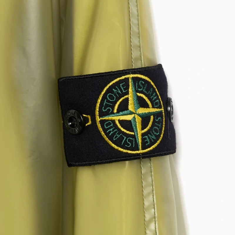 Stone Island Translucent Cover Detachable Rain Jacket 2 Stone Island Translucent Cover Detachable Rain Jacket <p>Shop the <strong>Stone Island Translucent Cover Detachable Rain Jacket</strong> for a clean windbreaker-inspired look. A versatile outerwear choice for casual layering, athletic styling, streetwear outfits, and transitional-season fashion.</p>