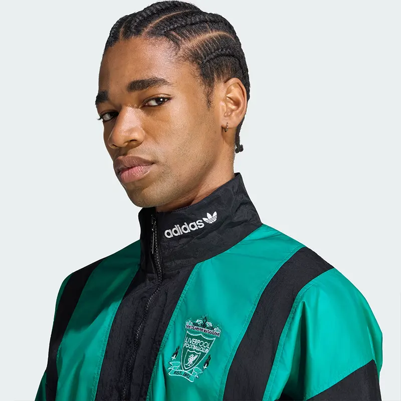 Adidas Liverpool FC EQT Track Top Adidas Liverpool FC EQT Track Top <p>Shop the Adidas Liverpool FC EQT Track Top, a heritage-inspired track top that blends football culture with classic Adidas styling. Ideal for casual wear, match-day outfits, and retro sportswear looks, this piece adds recognizable club or national-team identity to your wardrobe. A versatile choice for collectors and fans.</p>