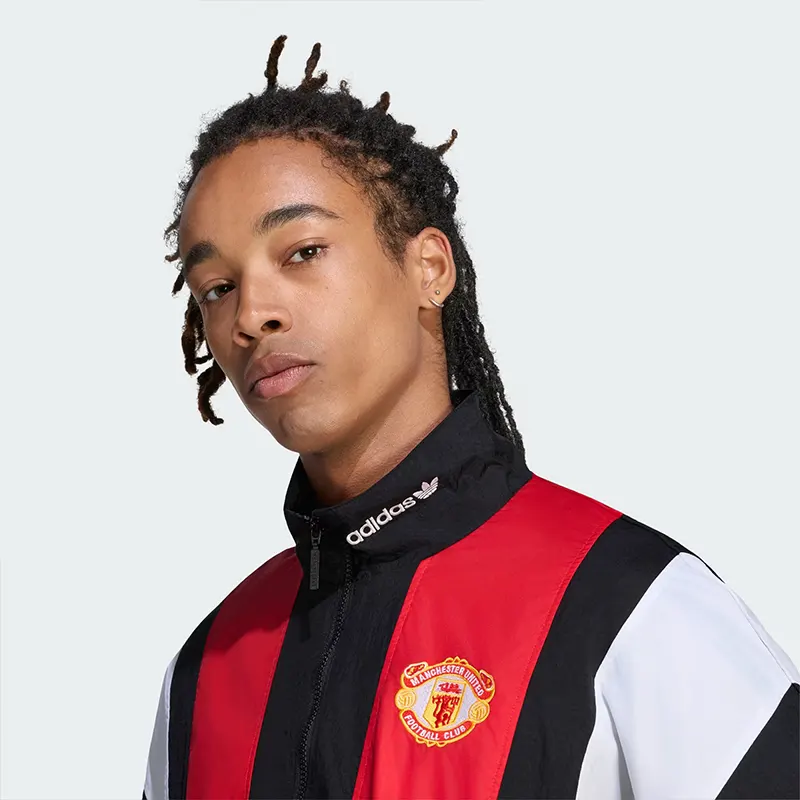 Adidas Manchester United EQT Track Top Adidas Manchester United EQT Track Top <p>Shop the Adidas Manchester United EQT Track Top, a heritage-inspired track top that blends football culture with classic Adidas styling. Ideal for casual wear, match-day outfits, and retro sportswear looks, this piece adds recognizable club or national-team identity to your wardrobe. A versatile choice for collectors and fans.</p>