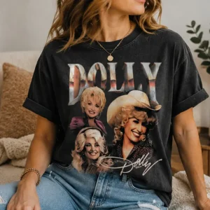 Areena Design <p>Celebrate country music style with the Dolly Parton Vintage T-shirt, featuring a nostalgic graphic-inspired look that adds character to everyday outfits. The vintage aesthetic pairs naturally with denim, shorts, boots, or layered jackets. Shop the Dolly Parton vintage T-shirt online for retro casual styling, music-inspired fashion, and statement graphic tee looks.</p> Dolly Parton Vintage T-shirt <p>Celebrate country music style with the Dolly Parton Vintage T-shirt, featuring a nostalgic graphic-inspired look that adds character to everyday outfits. The vintage aesthetic pairs naturally with denim, shorts, boots, or layered jackets. Shop the Dolly Parton vintage T-shirt online for retro casual styling, music-inspired fashion, and statement graphic tee looks.</p>