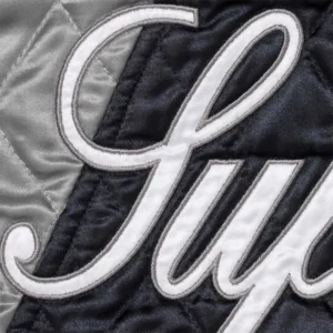 Areena Design <p>Elevate your wardrobe with the <strong>Supreme Champion Navy Quilted Satin Varsity Jacket</strong>, a standout jacket designed for fans of modern streetwear and statement fashion. Featuring smooth satin varsity styling and quilted detailing, it offers a versatile look for casual outfits, game-day style, concerts, and everyday wear. Shop the Supreme Champion Navy Quilted Satin Varsity Jacket online in the USA for a bold, trend-focused addition to your collection.</p> Supreme Champion Navy Quilted Satin Varsity Jacket <p>Elevate your wardrobe with the <strong>Supreme Champion Navy Quilted Satin Varsity Jacket</strong>, a standout jacket designed for fans of modern streetwear and statement fashion. Featuring smooth satin varsity styling and quilted detailing, it offers a versatile look for casual outfits, game-day style, concerts, and everyday wear. Shop the Supreme Champion Navy Quilted Satin Varsity Jacket online in the USA for a bold, trend-focused addition to your collection.</p>