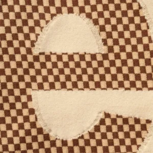 Areena Design <p>Shop the <strong>Supreme Light Tan Checkerboard Intarsia Top</strong>, a standout intarsia top designed with bold checkerboard knit pattern and premium intarsia-knit detailing. Ideal for streetwear rotations, seasonal layering, and collectors looking for a bold branded statement.</p> Men's Light Tan Supreme Checkerboard Intarsia Top