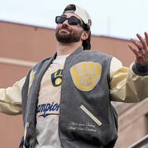 Areena Design <ul> <li>Material: Wool with Leather Sleeves</li> <li>Collar: Rib-Knitted Collar</li> <li>Cuffs: Rib-Knitted Cuffs</li> <li>Closure: Buttoned Closure</li> <li>Color: Gray & Cream</li> </ul> Brewers World Series Champions Destroyer Baseball Jacket <ul> <li>Material: Wool with Leather Sleeves</li> <li>Collar: Rib-Knitted Collar</li> <li>Cuffs: Rib-Knitted Cuffs</li> <li>Closure: Buttoned Closure</li> <li>Color: Gray & Cream</li> </ul>