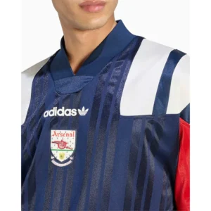 Areena Design <p>Discover the Adidas Originals Arsenal FC EQT Relaxed Men's Jersey T-Shirt, a football-inspired jersey T-shirt blending Adidas Originals styling with club heritage. Ideal for casual outfits, match-day looks, and retro sportswear collections, this piece delivers a distinctive fan-focused aesthetic. Shop it for an easy way to bring football culture into everyday style.</p> Adidas Originals Arsenal FC EQT Relaxed Men's Jersey T-Shirt <p>Discover the Adidas Originals Arsenal FC EQT Relaxed Men's Jersey T-Shirt, a football-inspired jersey T-shirt blending Adidas Originals styling with club heritage. Ideal for casual outfits, match-day looks, and retro sportswear collections, this piece delivers a distinctive fan-focused aesthetic. Shop it for an easy way to bring football culture into everyday style.</p>