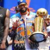 Areena Design <ul> <li>Material: Wool with Leather Sleeves</li> <li>Collar: Rib-Knitted Collar</li> <li>Cuffs: Rib-Knitted Cuffs</li> <li>Closure: Buttoned Closure</li> <li>Color: Gray & Cream</li> </ul> Karl-Anthony Towns New York Knicks 2026 Finals Jacket <ul> <li>Material: Wool with Leather Sleeves</li> <li>Collar: Rib-Knitted Collar</li> <li>Cuffs: Rib-Knitted Cuffs</li> <li>Closure: Buttoned Closure</li> <li>Color: Gray & Cream</li> </ul>