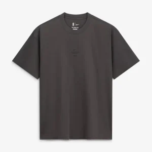 Areena Design <p>Shop the Nike x NBA New York Knicks 2026 Standard Issue Max 90 T-Shirt in Charcoal Cotton, made for comfortable everyday wear, easy layering, game days, tra Nike x NBA New York Knicks 2026 Standard Issue Max 90 T-Shirt