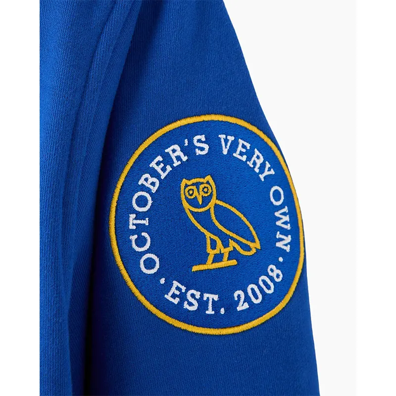 OVO Degrassi Fleece Varsity 1 OVO Degrassi Fleece Varsity <p>Shop the OVO Degrassi Fleece Varsity, a statement varsity jacket inspired by iconic sports culture. With its recognizable team-focused identity, it is ideal for game-day outfits, casual layering, and collectible fanwear. Add this varsity jacket to your wardrobe for a bold blend of athletic heritage and street style.</p>