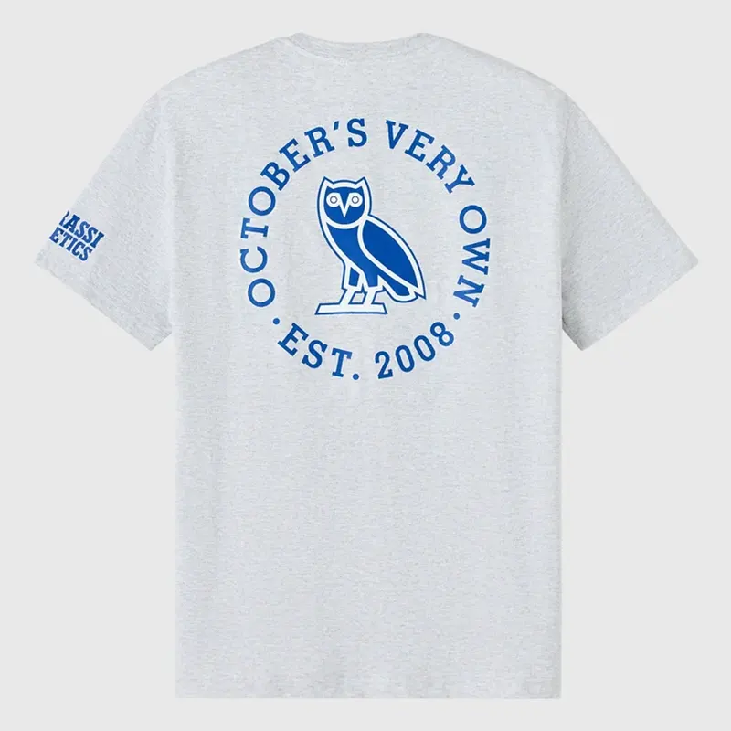 OVO Degrassi Panthers Ash Heather Grey Tee 2 OVO Degrassi Panthers Ash Heather Grey Tee <p>Shop the OVO Degrassi Panthers Ash Heather Grey Tee, a statement T-shirt inspired by sport, streetwear, or fan culture. Its recognizable graphic and branded identity make it easy to style with jeans, shorts, or layered outfits. Add the OVO Degrassi Panthers Ash Heather Grey Tee to your rotation for comfortable-looking, versatile everyday style.</p>