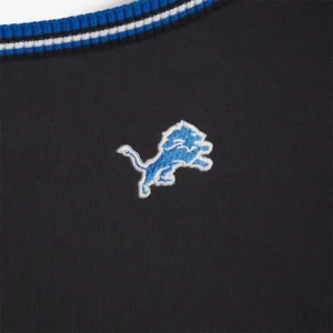 Areena Design <p>Show your team pride in this Black Fleece top. Soft, versatile, and easy to style, it brings comfortable team spirit to game days, casual weekends, travel, and everyday layering with a polished athletic finish.</p> Off Season x NFL Detroit Lions Off The Shoulder Long Sleeve Top
