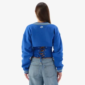 Areena Design <p>Show your team pride in this Royal Fleece cami. Soft, versatile, and easy to style, it brings comfortable team spirit to game days, casual weekends, travel, and everyday layering with a polished athletic finish.</p> Off Season x NFL Los Angeles Rams Shrug Cami
