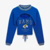Areena Design <p>Show your team pride in this Cream Fleece cami. Soft, versatile, and easy to style, it brings comfortable team spirit to game days, casual weekends, travel, and everyday layering with a polished athletic finish.</p> Off Season x NFL Los Angeles Rams Shrug Cami