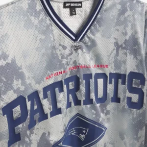 Areena Design <p>Show your team pride in this Gray Polyester top. Soft, versatile, and easy to style, it brings comfortable team spirit to game days, casual weekends, travel, and everyday layering with a polished athletic finish.</p> Off Season x NFL New England Patriots Camo Mesh Long Sleeve V-Neck Top
