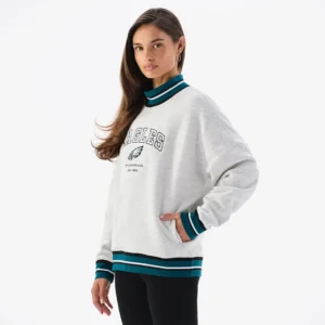 Areena Design <p>Show your team pride in this Heather Gray Fleece sweatshirt. Soft, versatile, and easy to style, it brings comfortable team spirit to game days, casual weekends, travel, and everyday layering with a polished athletic finish.</p> Off Season x NFL Philadelphia Eagles Mock Neck Sweatshirt