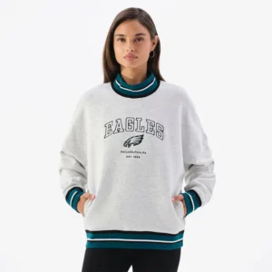 Areena Design <p>Show your team pride in this Heather Gray Fleece sweatshirt. Soft, versatile, and easy to style, it brings comfortable team spirit to game days, casual weekends, travel, and everyday layering with a polished athletic finish.</p> Off Season x NFL Philadelphia Eagles Mock Neck Sweatshirt