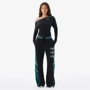 Areena Design <p>Show your team pride in this Black Fleece top. Soft, versatile, and easy to style, it brings comfortable team spirit to game days, casual weekends, travel, and everyday layering with a polished athletic finish.</p> Off Season x NFL Philadelphia Eagles Off The Shoulder Long Sleeve Top