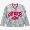 Areena Design <p>Show your team pride in this Gray Polyester top. Soft, versatile, and easy to style, it brings comfortable team spirit to game days, casual weekends, travel, and everyday layering with a polished athletic finish.</p> Off Season x NFL San Francisco 49ers Camo Mesh Long Sleeve V-Neck Top