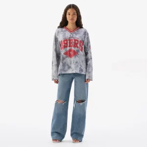 Areena Design <p>Show your team pride in this Gray Polyester top. Soft, versatile, and easy to style, it brings comfortable team spirit to game days, casual weekends, travel, and everyday layering with a polished athletic finish.</p> Off Season x NFL San Francisco 49ers Camo Mesh Long Sleeve V-Neck Top