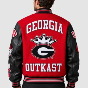 Areena Design <ul> <li>Material: Wool with Leather Sleeves</li> <li>Collar: Rib-Knitted Collar</li> <li>Cuffs: Rib-Knitted Cuffs</li> <li>Closure: Buttoned Closure</li> <li>Color: Gray & Cream</li> </ul> Outkast x UGA x Nike Destroyer Jacket <ul> <li>Material: Wool with Leather Sleeves</li> <li>Collar: Rib-Knitted Collar</li> <li>Cuffs: Rib-Knitted Cuffs</li> <li>Closure: Buttoned Closure</li> <li>Color: Gray & Cream</li> </ul>